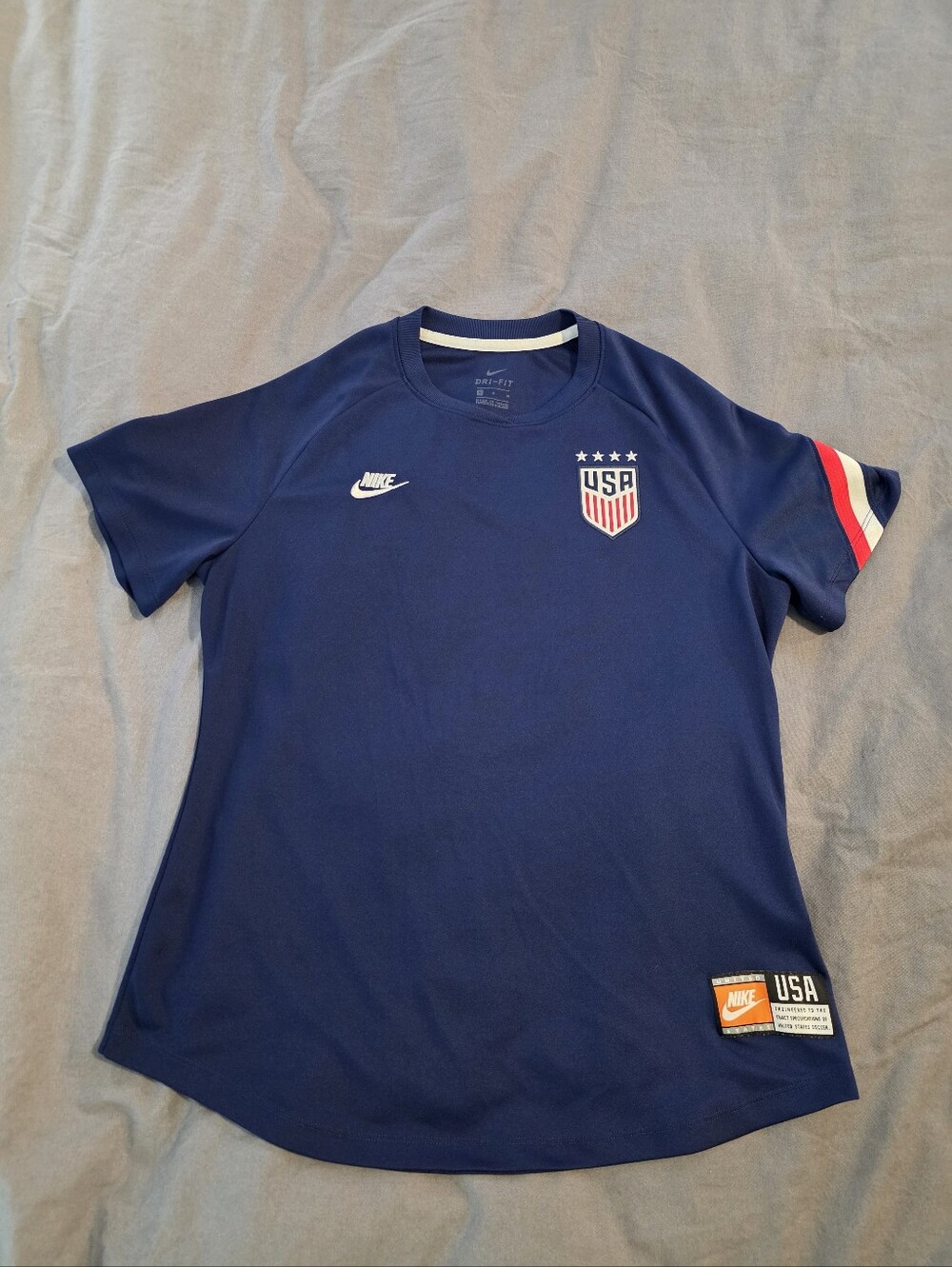 Nike Navy Women's USA Short Sleeve Soccer Jersey with Red & White Sleeve Stripes
